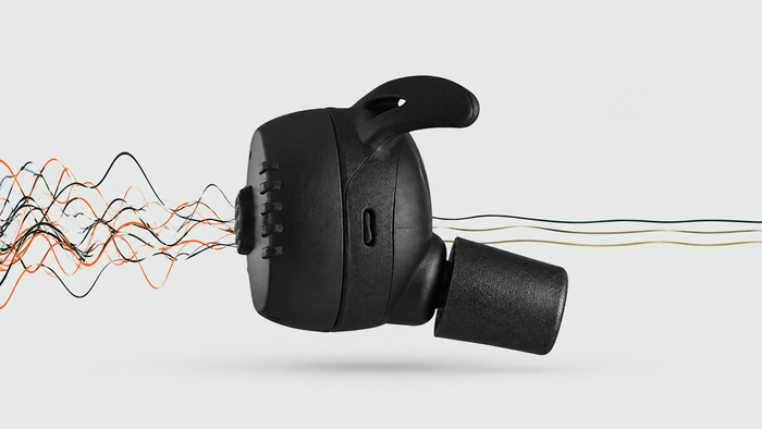 Close view of a black Field Signal earbud
